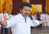 Actor Vijay (Thalapathy) supporters celebrating TVK party's lead in Tamil Nadu Assembly Elections 2026 with posters and sweets in Chennai.