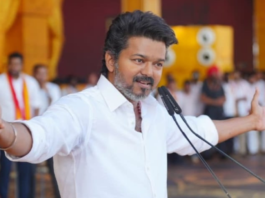 Actor Vijay (Thalapathy) supporters celebrating TVK party's lead in Tamil Nadu Assembly Elections 2026 with posters and sweets in Chennai.