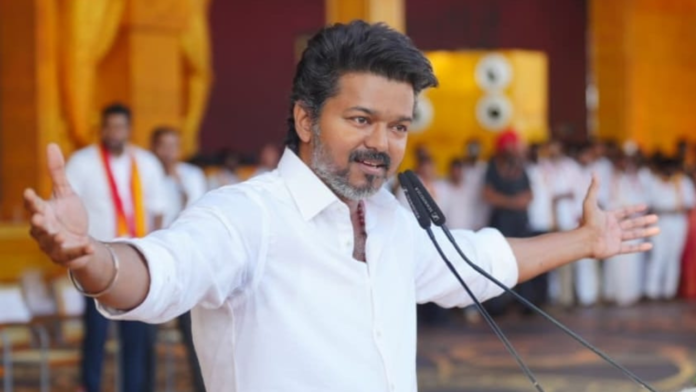 Actor Vijay (Thalapathy) supporters celebrating TVK party's lead in Tamil Nadu Assembly Elections 2026 with posters and sweets in Chennai.