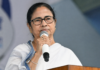 BJP workers celebrating victory in West Bengal Election Results 2026 at Kolkata party office with saffron flags and gulal.